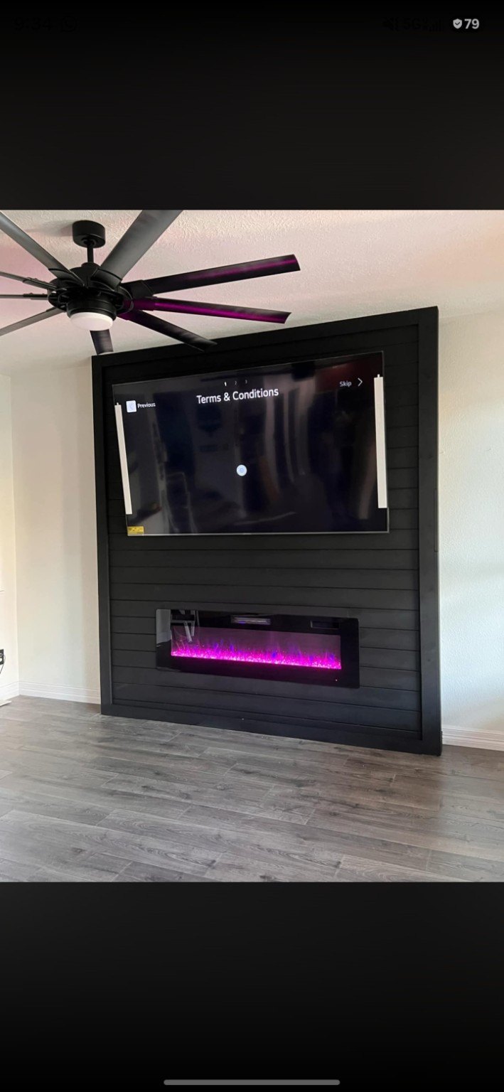 Custom TV and fireplace feature wall