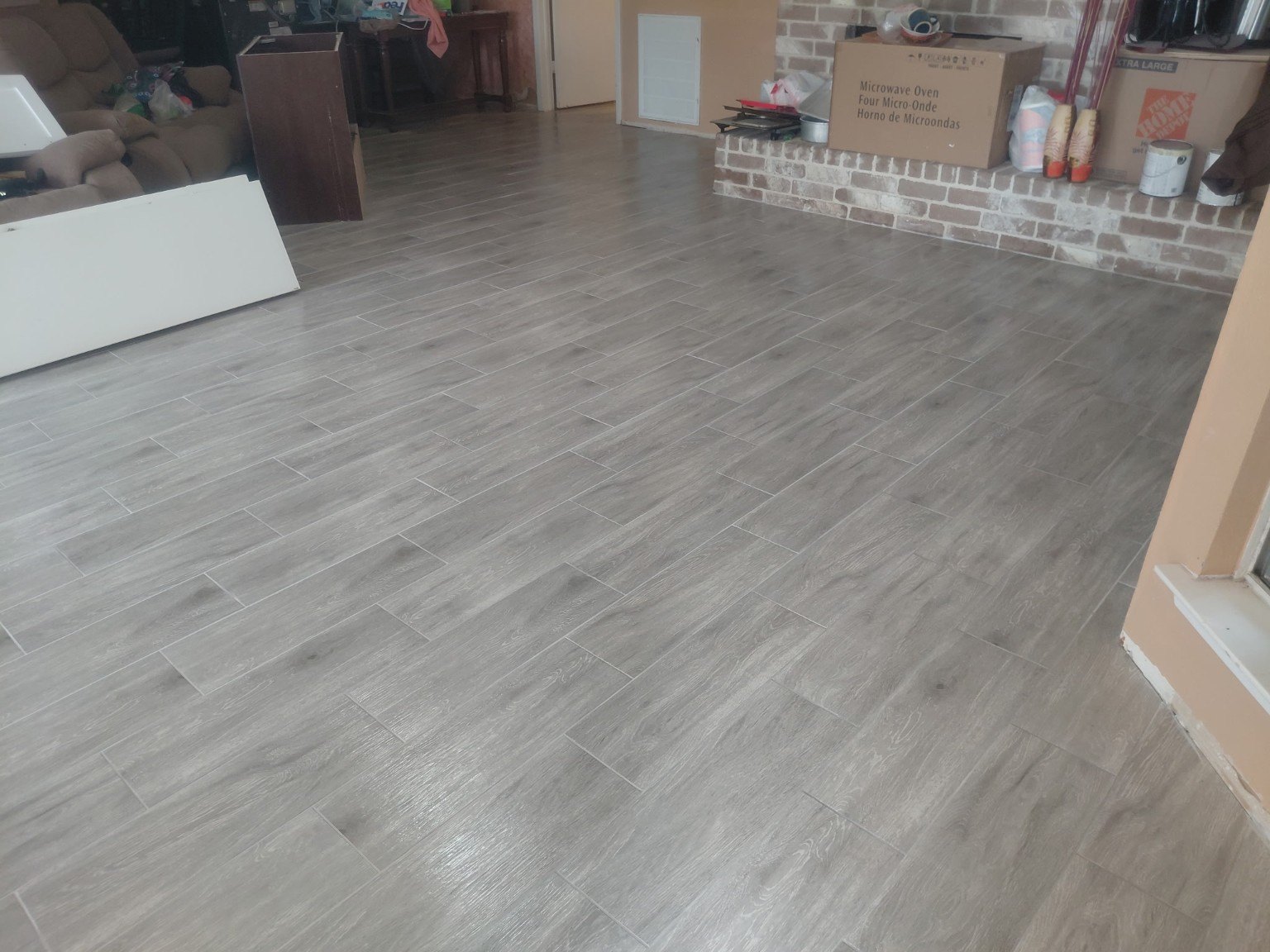 Wood-look tile flooring installation